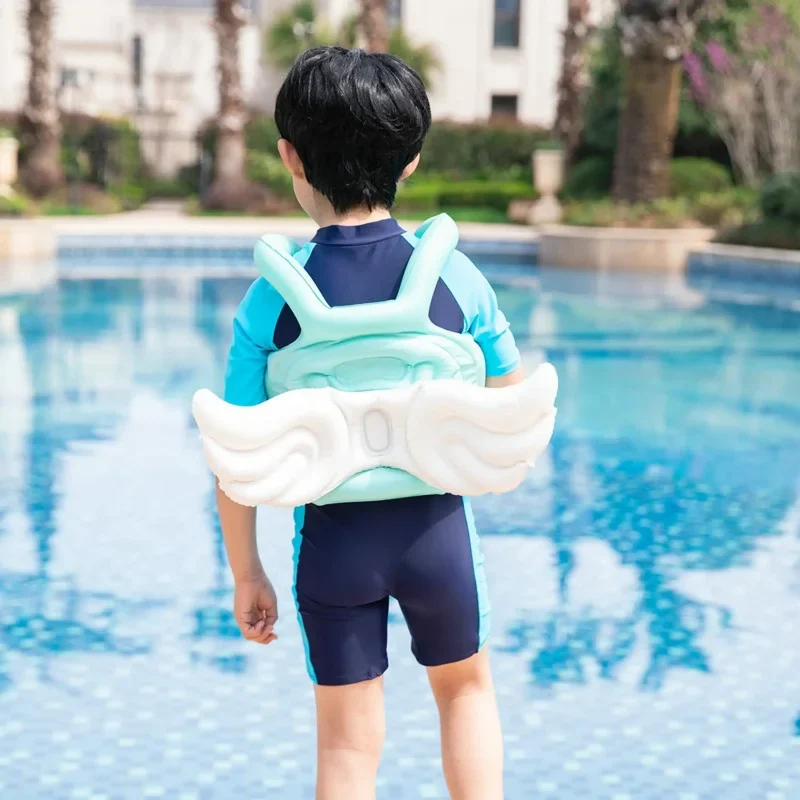 Kinder Schwimmweste mit Engel, Einhorn oder Dino Design, Aufblasbare Schwimmhilfe, Schwimmen lernen für Jungen & Mädchen – Größe M/L in Rosa, Grün & Gelb