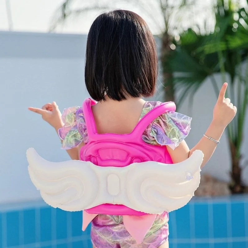Kinder Schwimmweste mit Engel, Einhorn oder Dino Design, Aufblasbare Schwimmhilfe, Schwimmen lernen für Jungen & Mädchen – Größe M/L in Rosa, Grün & Gelb